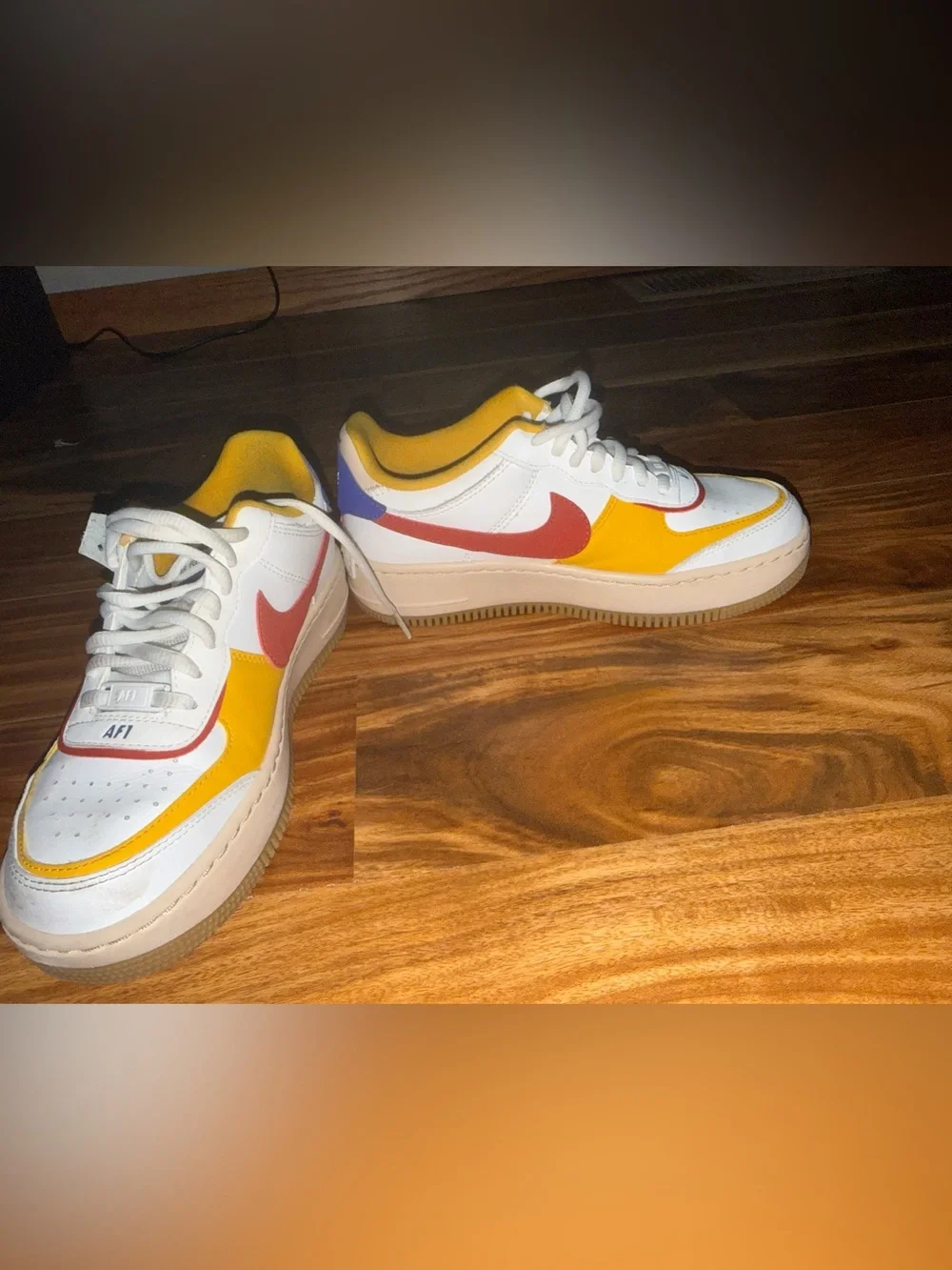 Nike White Low-Top Sneakers with green, Yellow & Red Accents